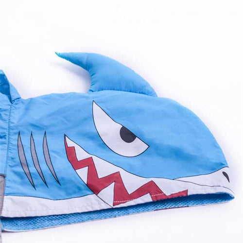 Close-up of shark face graphic on blue dog raincoat hood