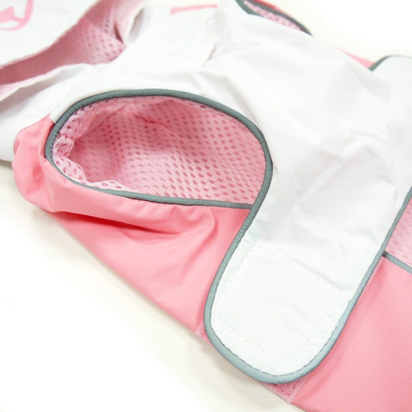 Pink and white raincoat sleeve/leg opening with mesh lining and teal piping