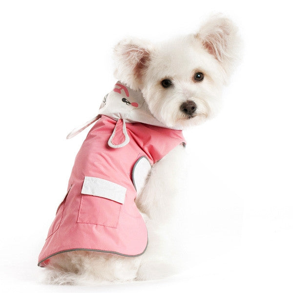 Pink dog raincoat with bunny hood and front pocket panel, worn by small white dog