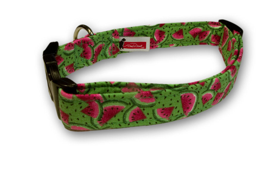 Watermelon-print dog collar with metal buckle, D-ring, and stitched fabric edges.