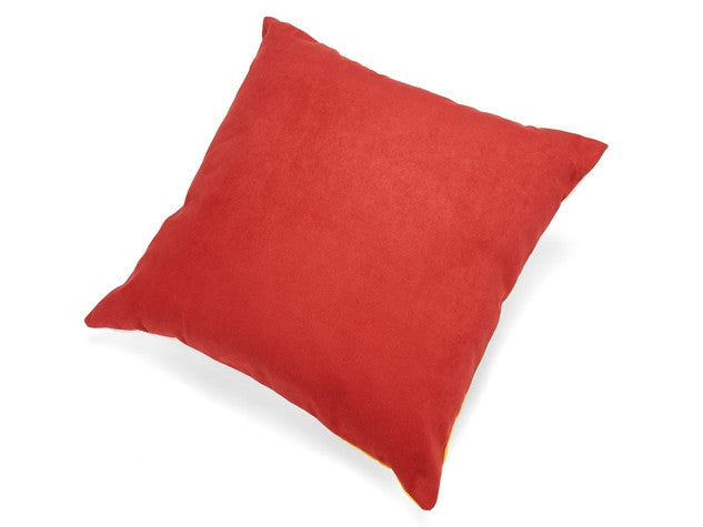 Red accent pillow with solid color, square shape