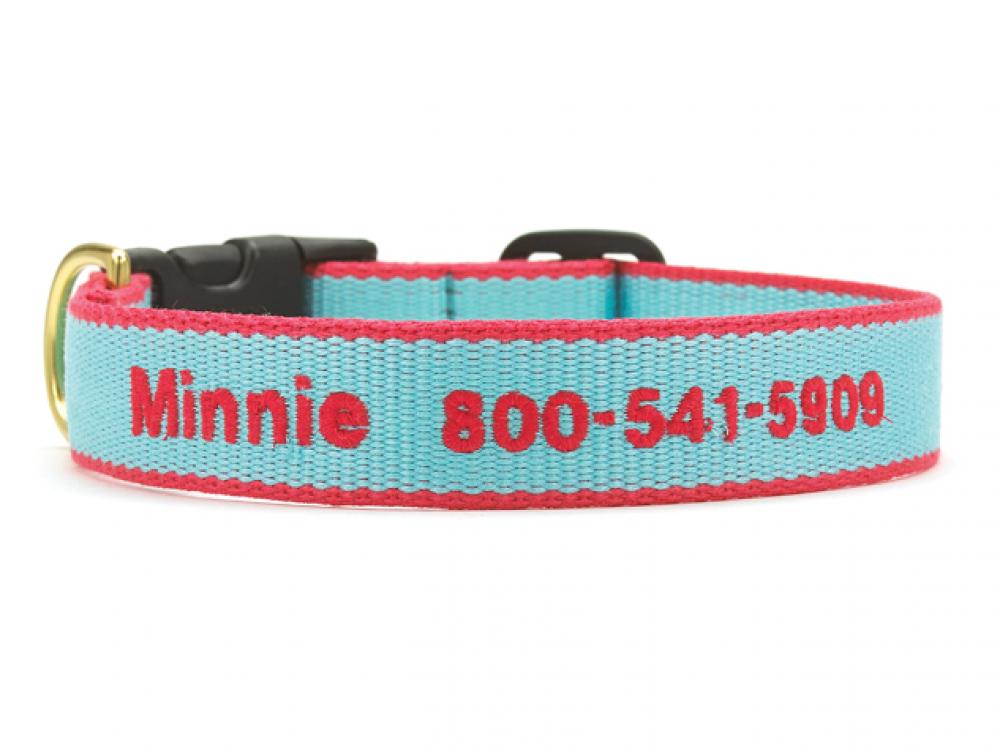 Personalized dog collar in aqua and coral with “Minnie” text and phone number