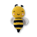 Crochet bee dog toy with yellow body, black stripes, and soft white wings