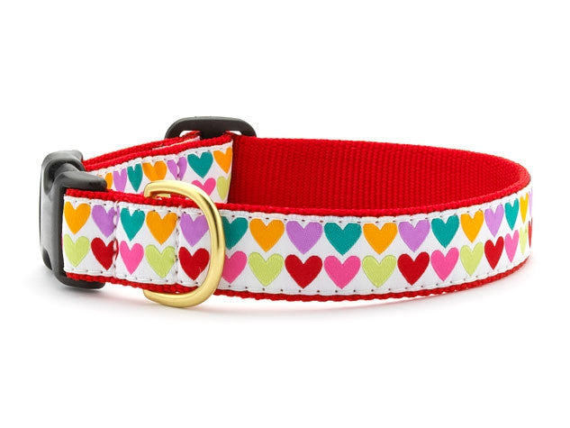 Dog collar with multicolor heart pattern, red strap, black buckle and metal ring