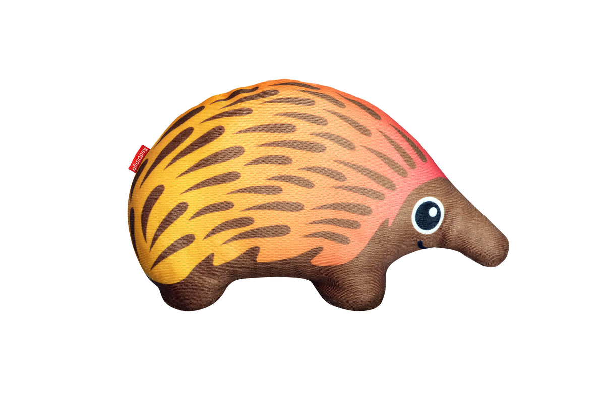 Durables plush dog toy echidna with tan-and-brown spines and round blue eye