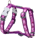 Purple patterned dog harness with chest straps and metal leash attachment clips