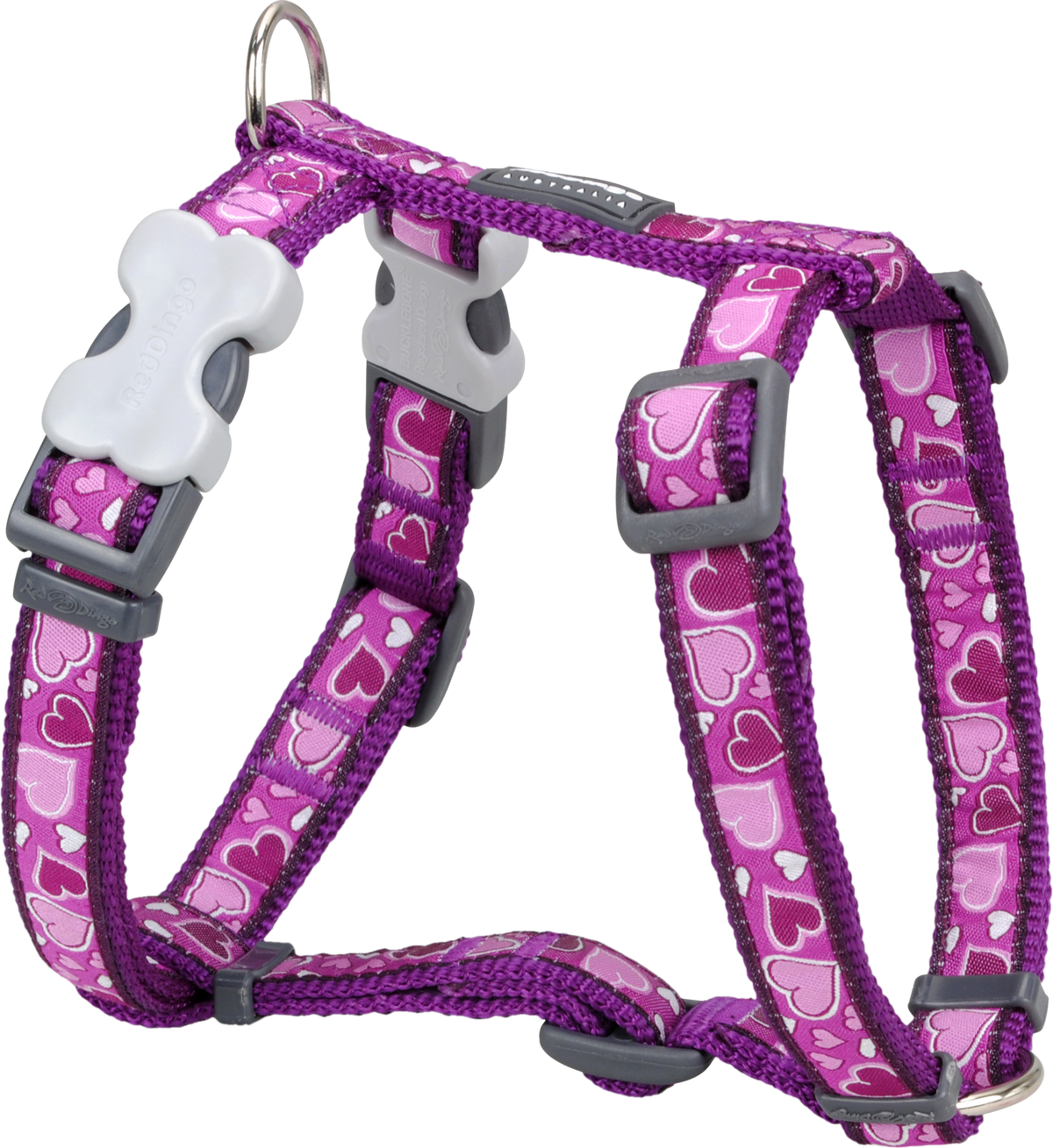Purple patterned dog harness with chest straps and metal leash attachment clips