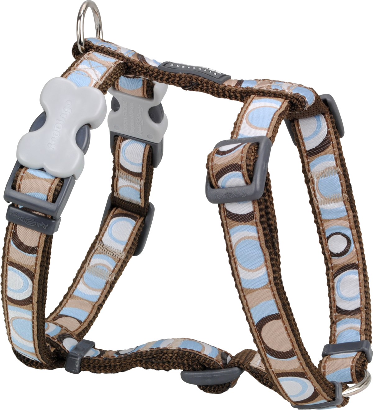 Brown designer dog harness with adjustable straps and circular pattern, gray hardware