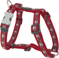 Red dog harness with skull-and-roses pattern, adjustable straps and leash ring