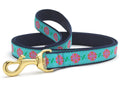 Teal floral dog leash with navy trim and gold metal clip, 5 ft