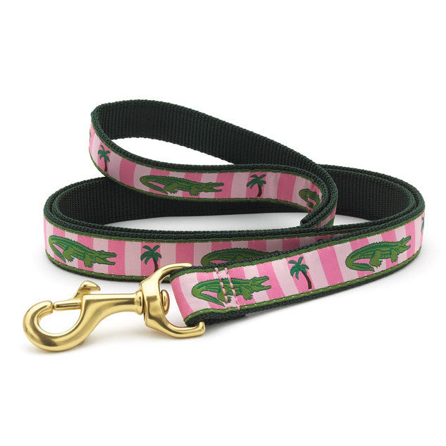 Dog collar with pink/green alligator print and dark green strap, gold D-ring hardware