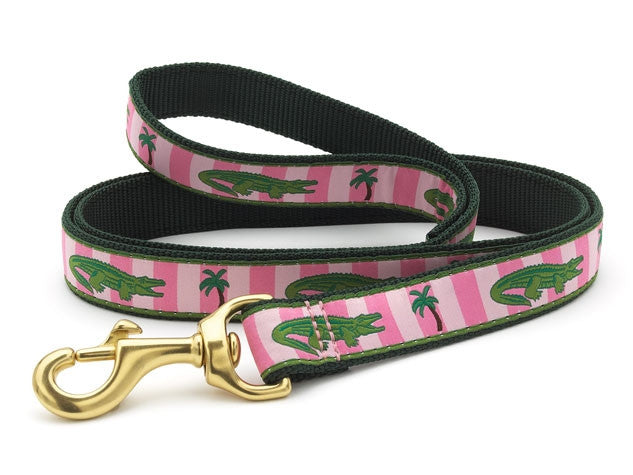 Pink dog leash with green alligator print and brass-tone trigger clip, fabric webbing