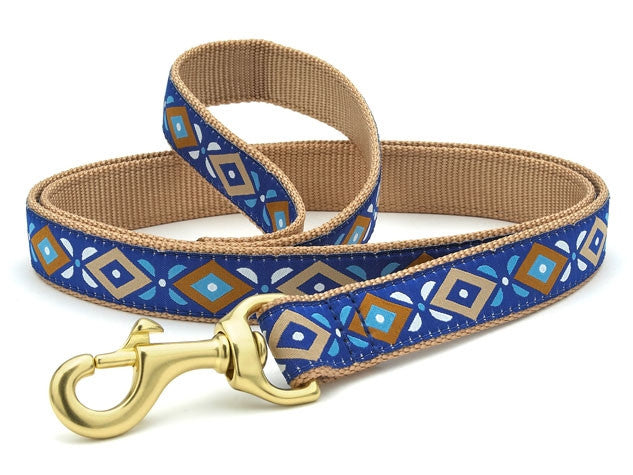 Blue aztec dog collar with tan strap, gold D-ring and matching leash hardware