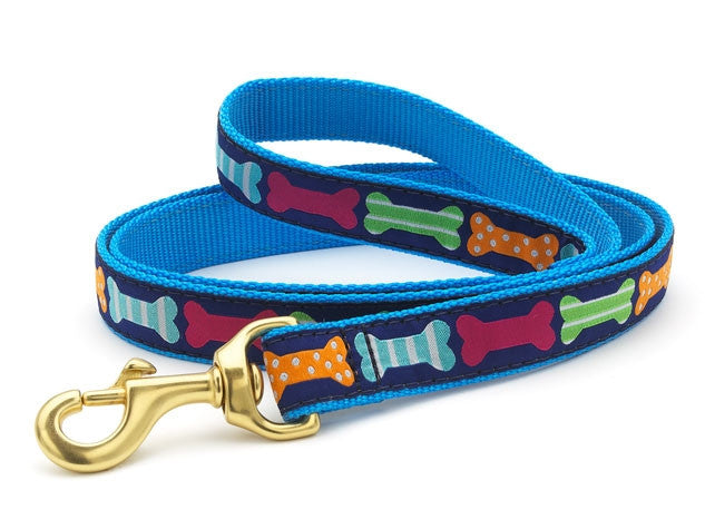 Blue patterned dog leash with colorful bone print and brass metal clasp
