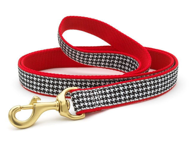 Houndstooth dog leash with red trim and brass clasp, flat woven webbing