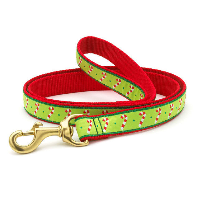 Red and green dog collar with candy cane pattern, brass ring and D-buckle