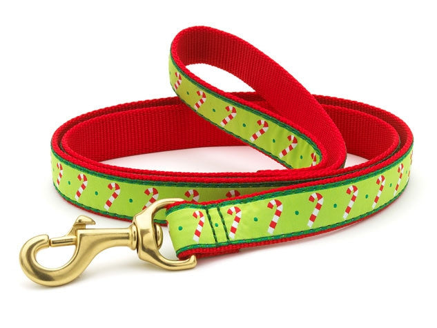 Red and green candy-cane patterned dog leash with brass snap and D-ring