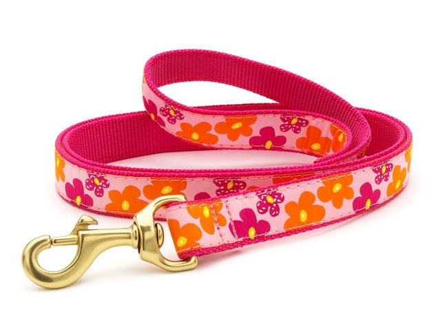 Pink floral dog leash with orange and yellow flower print and brass clip, 5 ft