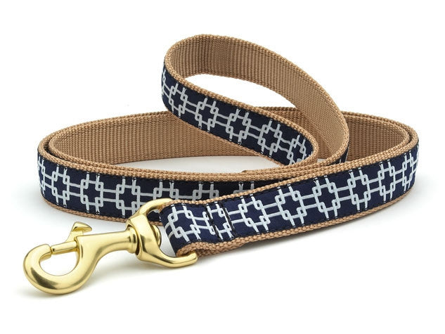 Gridlock pattern dog leash with brass clasp and tan webbing trim