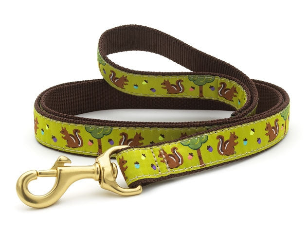 Dog collar with lime green dachshund pattern, brass hardware, dark brown webbing