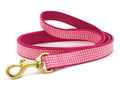 Pink gingham dog leash with gold metal clasp and pink ribbon trim
