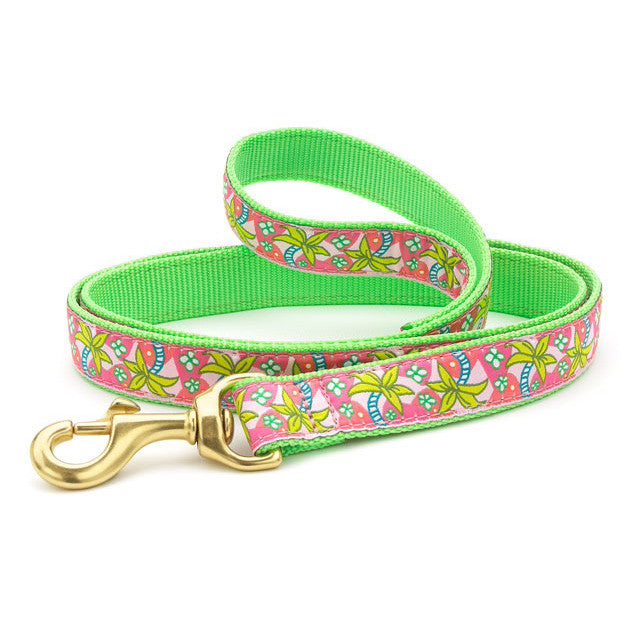 Pink floral-and-leaf dog collar with bright green webbing and gold D-ring
