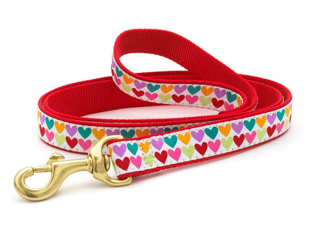 Red dog leash with multicolor heart print and brass metal clasp