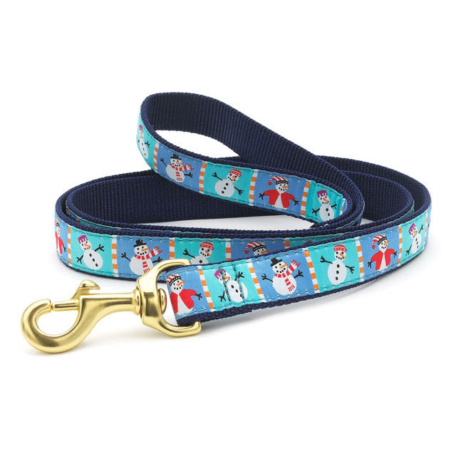 Snowman print dog collar with brass buckle and D-ring on blue fabric webbing