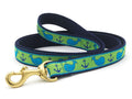 Blue and navy whale-and-anchor dog leash with gold metal clasp and loop handle