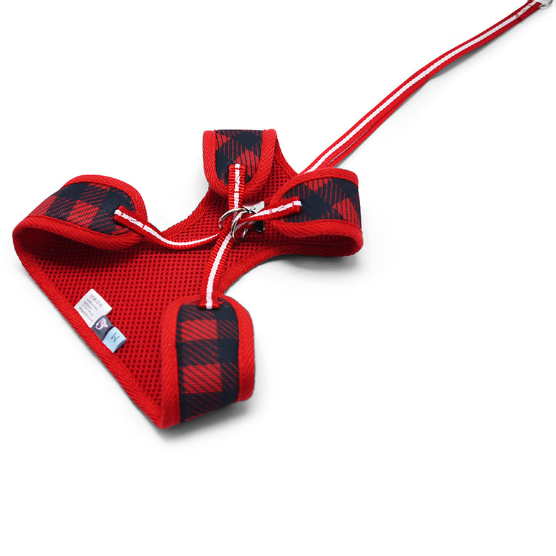 Red plaid fabric dog harness with D-ring and front openings, adjustable pull lead