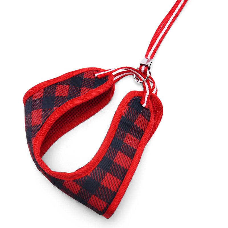 Red plaid step-in dog harness with front straps and metal ring attachment