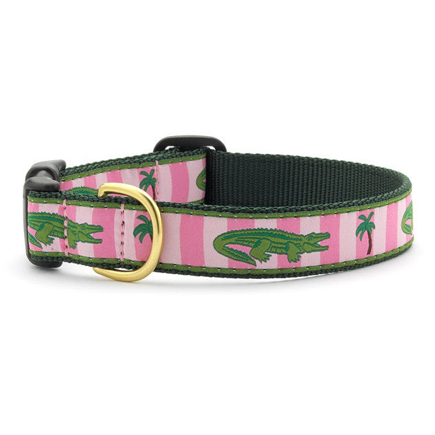 Dog collar: pink/green alligator print, dark green webbing, gold buckle