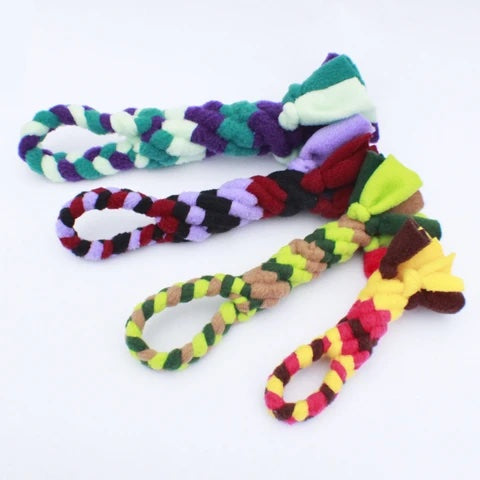 Striped fleece tug toy set with colorful braided loops and plush paw-like ends