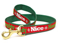 Green and red dog leash with gold metal clasp and festive 'Nice' 'Naughty' webbing