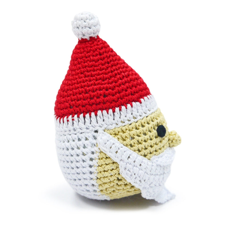 Crocheted Santa dog toy with squeaker, red hat, yellow face, white body and legs