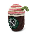 Crochet dog toy coffee cup, dark brown with pink/cream top, green handle and Bark Cafe logo