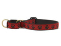 Red martingale dog collar with black paw prints, D-ring and buckle