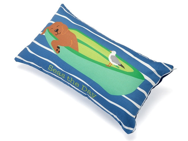 Nautical striped accent pillow with beach animal illustration and green sea panel