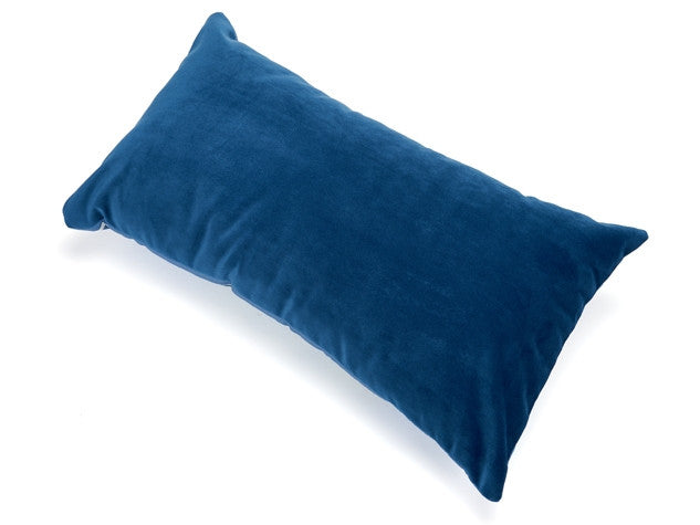 Solid blue accent pillow with soft velvety fabric