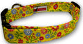 Trellis-pattern dog collar with multicolor flowers on yellow-green fabric, gold ring