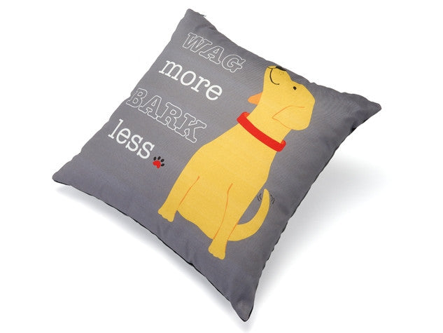 Gray accent pillow with yellow dog illustration and text: “WAG MORE BARK LESS”