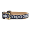 Woven dog collar with tan webbing and navy grid pattern, brass buckle and D-ring