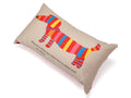 Beige accent pillow with colorful striped elephant graphic and motivational text