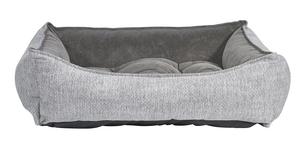 Gray scoop-style dog bed with cushioned inner pad and raised side bolsters