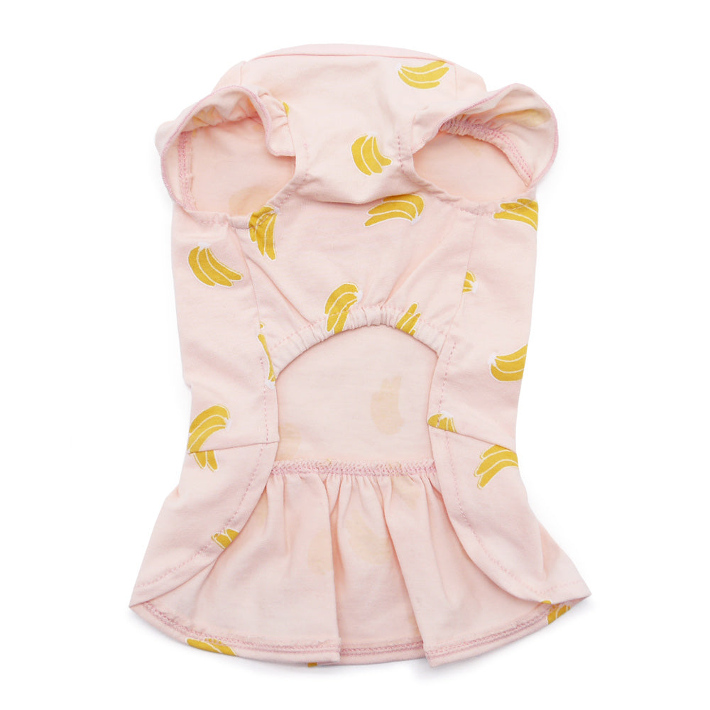 Pink banana-print dog dress with gathered skirt and back opening