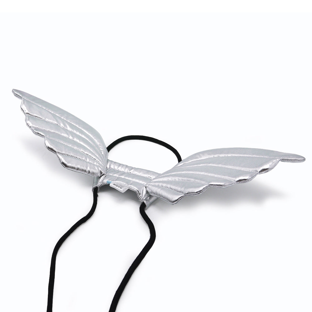 Silver angel dog wings accessory with black elastic straps and feathered wing shape