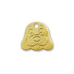 Small brass dog face pet ID tag with hanging hole and simple engraved features