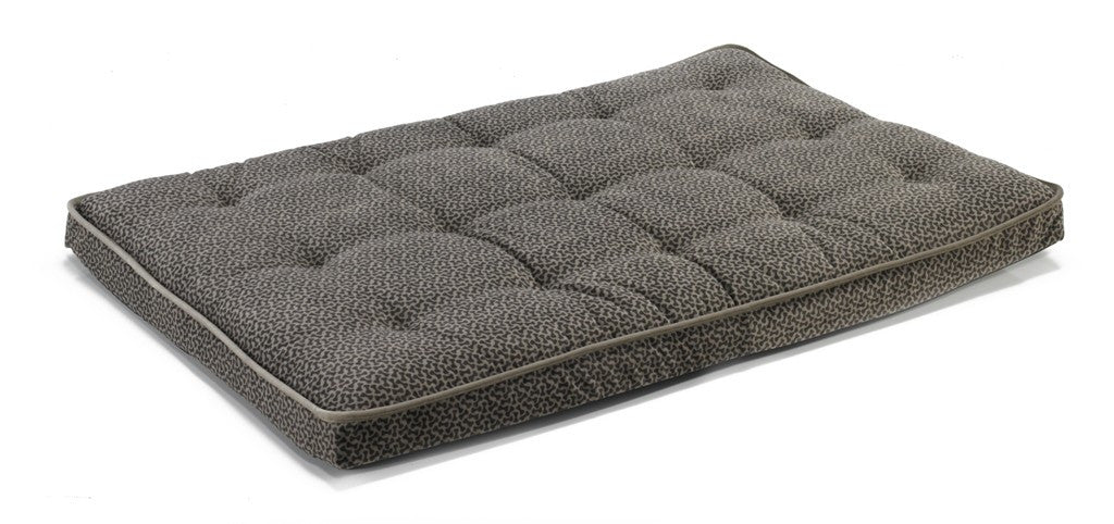 Gray quilted crate mattress with padded sides and textured fabric