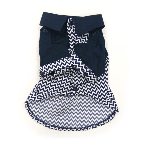 Navy chevron dog shirt with sleeveless cut, button front, and chest pocket detail.