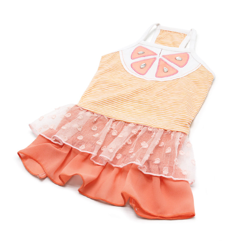 Orange and pink citrus dog dress with striped bodice, applique bib, and ruffled skirt hem